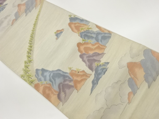 リサイクル　岩山に木々・雲模様織出し袋帯